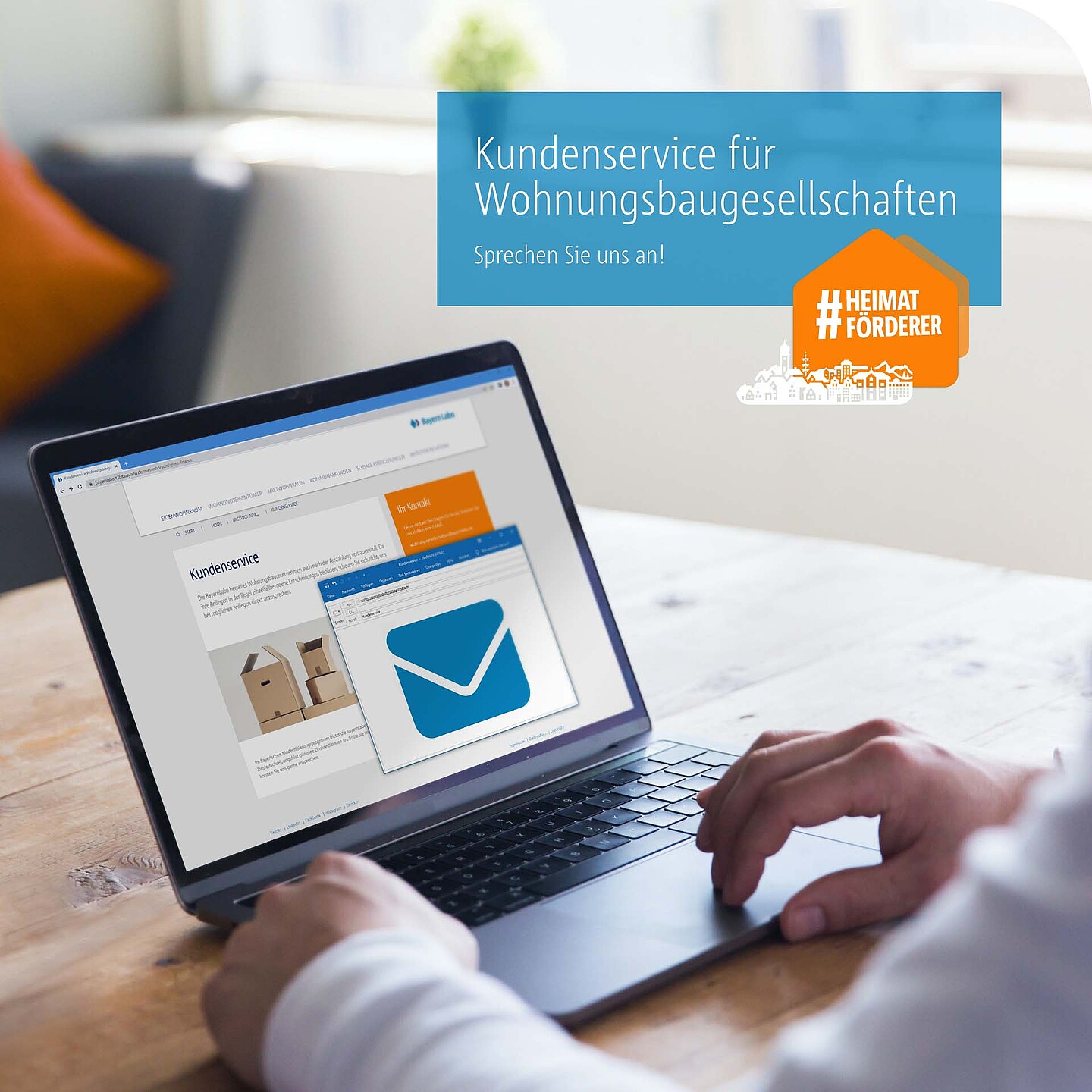 Kundenservice der BayernLabo für Wohnungsbaugesellschaften Laptop mit Kundenservice-Mail der BayernLabo als Ansprechpartner.